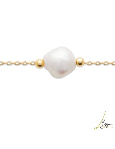 Bracelet en plaqué or et véritable perle de culture. Longueur: 18 cm, anneau à 16 cm