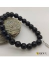 Bracelet perles agates noires pour femmes avec une plume en argent.
