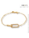 Bracelet en plaqué or pour femme avec 2 gros anneaux au centre rectangle. Un empierré. Longueur 18 cm.